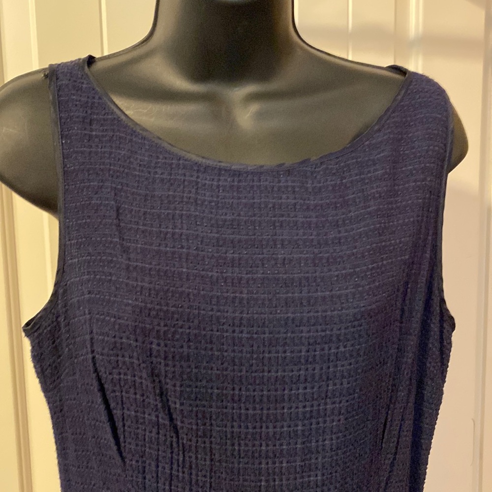 Navy fit and flare sleeveless dress with tan belt